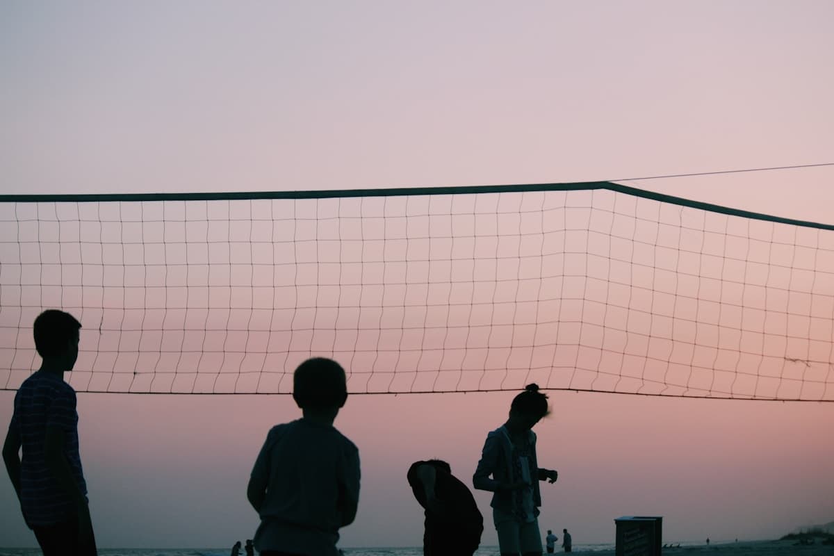 Beach volleyball at sunset on Perdido Key